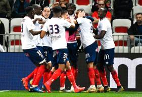 La joie des joueurs du Stade Malherbe Caen après le seul but de la rencontre, inscrit par Alexander Djiku 
